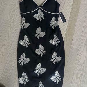 Chic Strapless Black Dress with Silver Bow Details